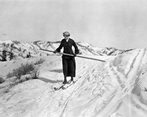 Woman on Skis with Pole