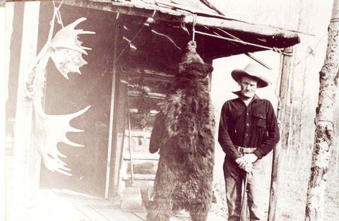 Cowboy with Hanging Bear